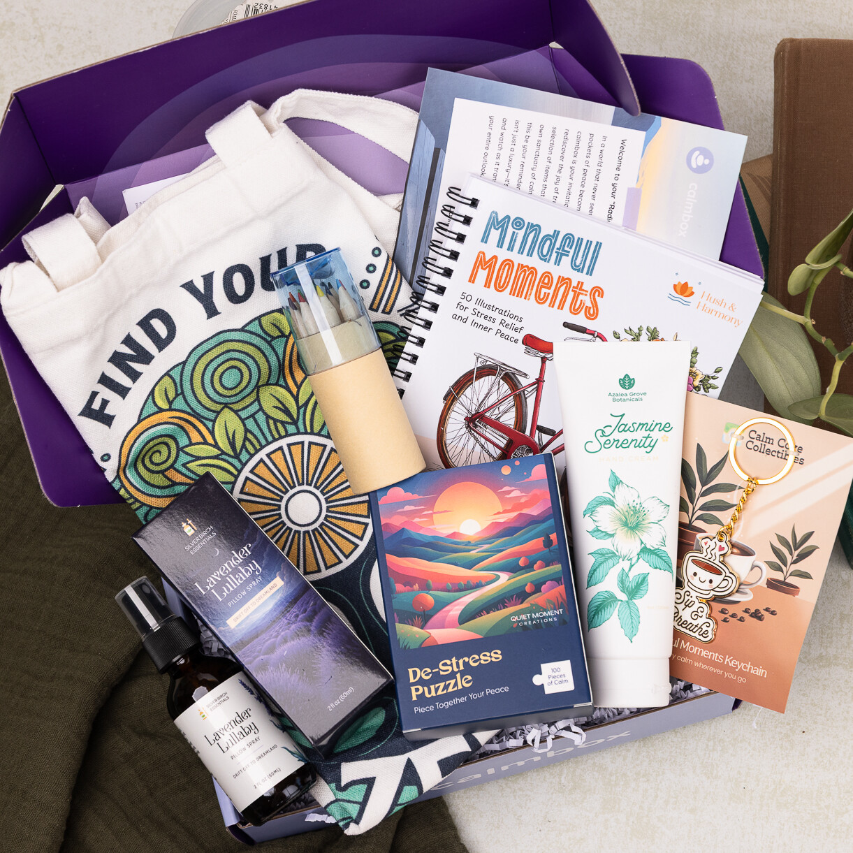 open calmbox with a Find Your Zen tote, puzzle, pillow spray and journal